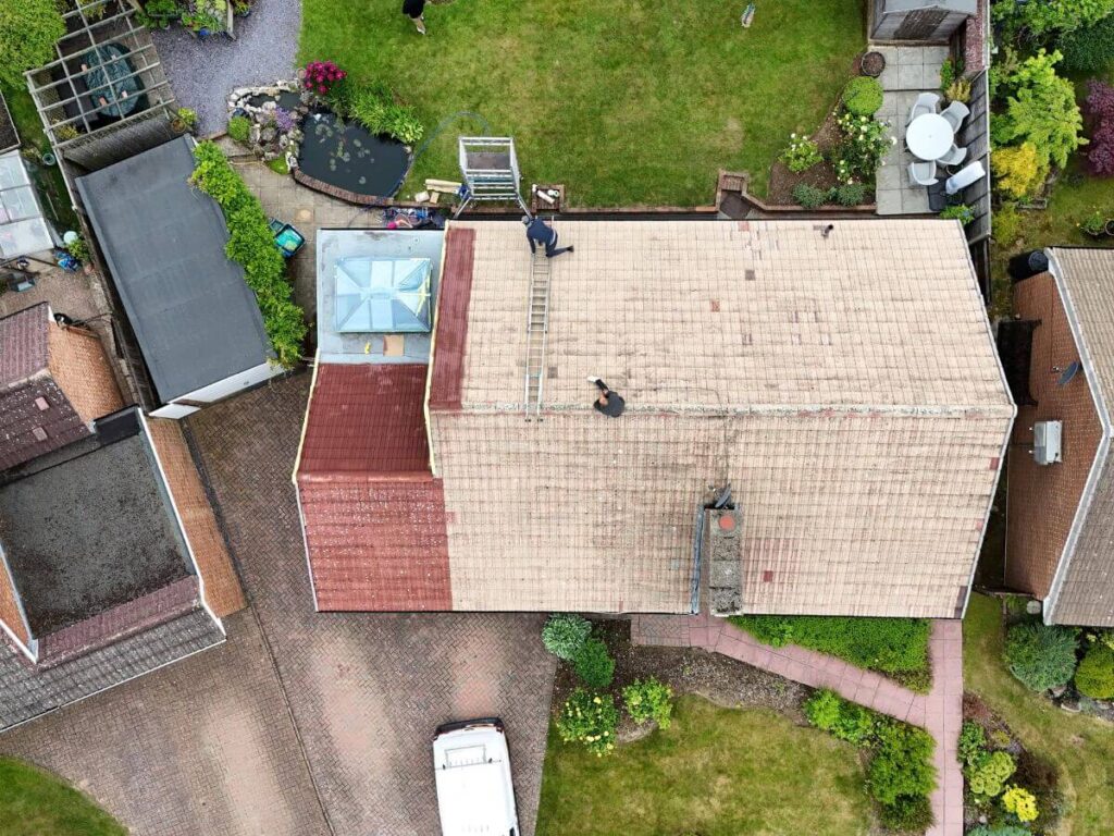 Aerial view of a residential roof following professional roof colour enhancement.